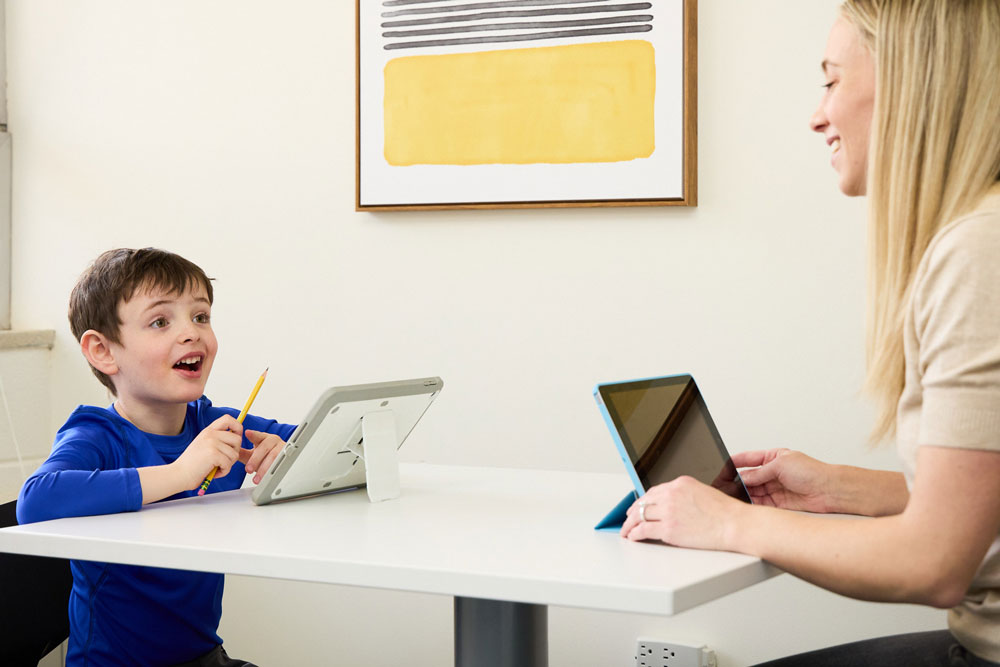 Dr. Tolinski performs a learning evaluation with a young boy at the Learning Evaluation Center in Littleton, Colorado